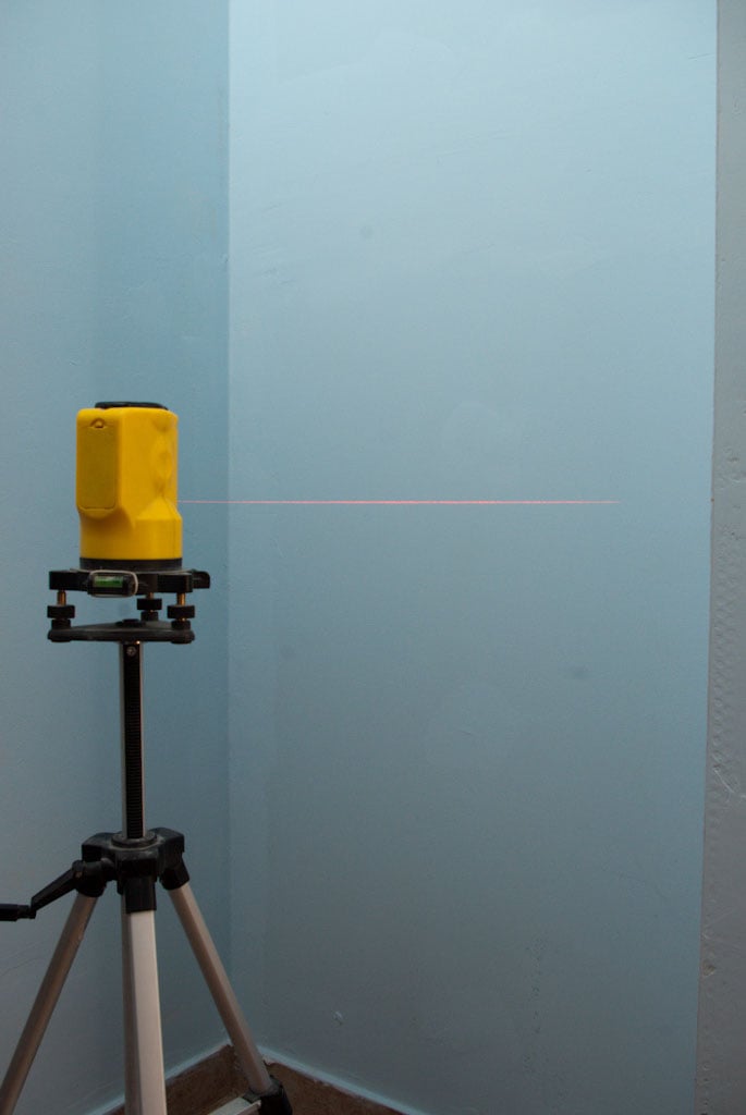 Using the laser level to install shelves
