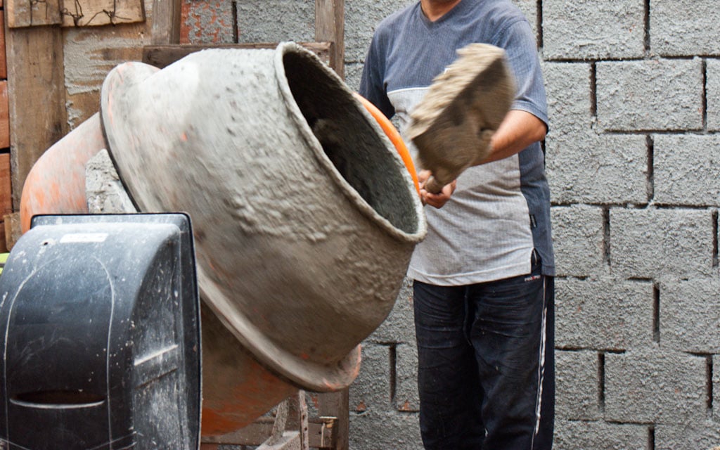 Mixing concrete with a power mixer