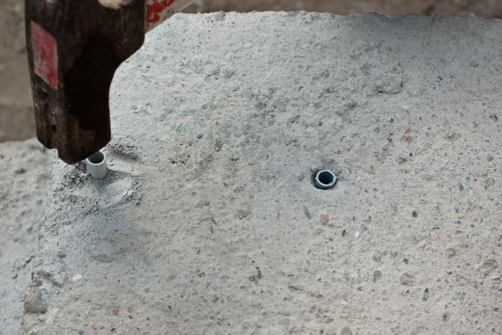Inserting anchors in concrete