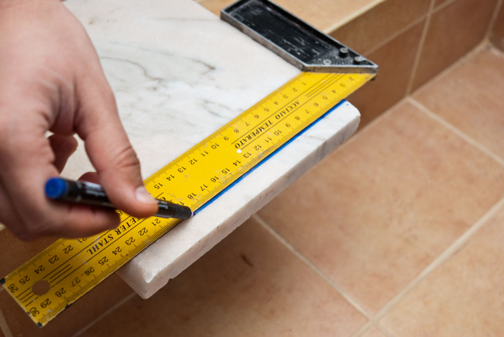 Marking cut line on marble sill