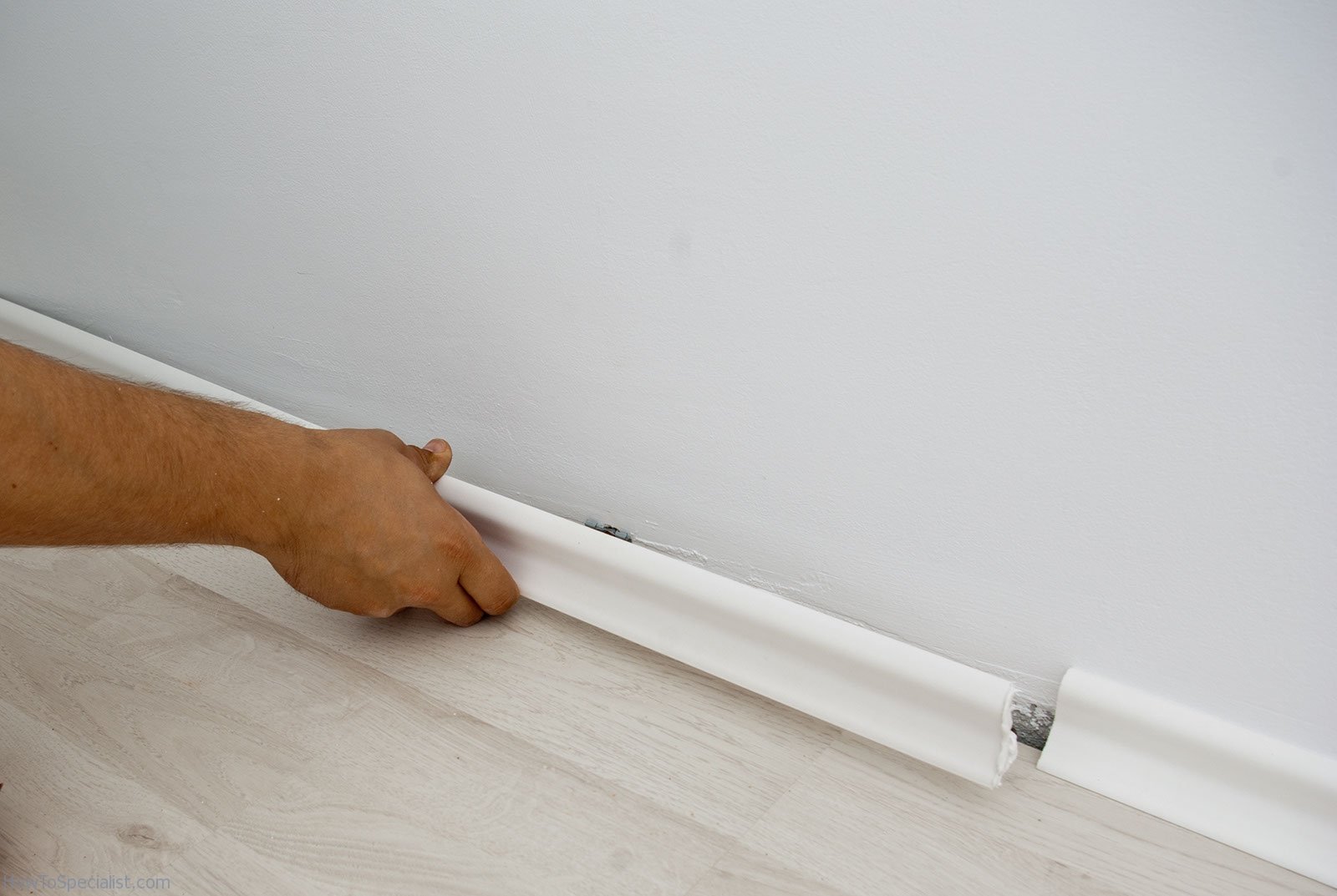 Baseboard electrical outlet strip