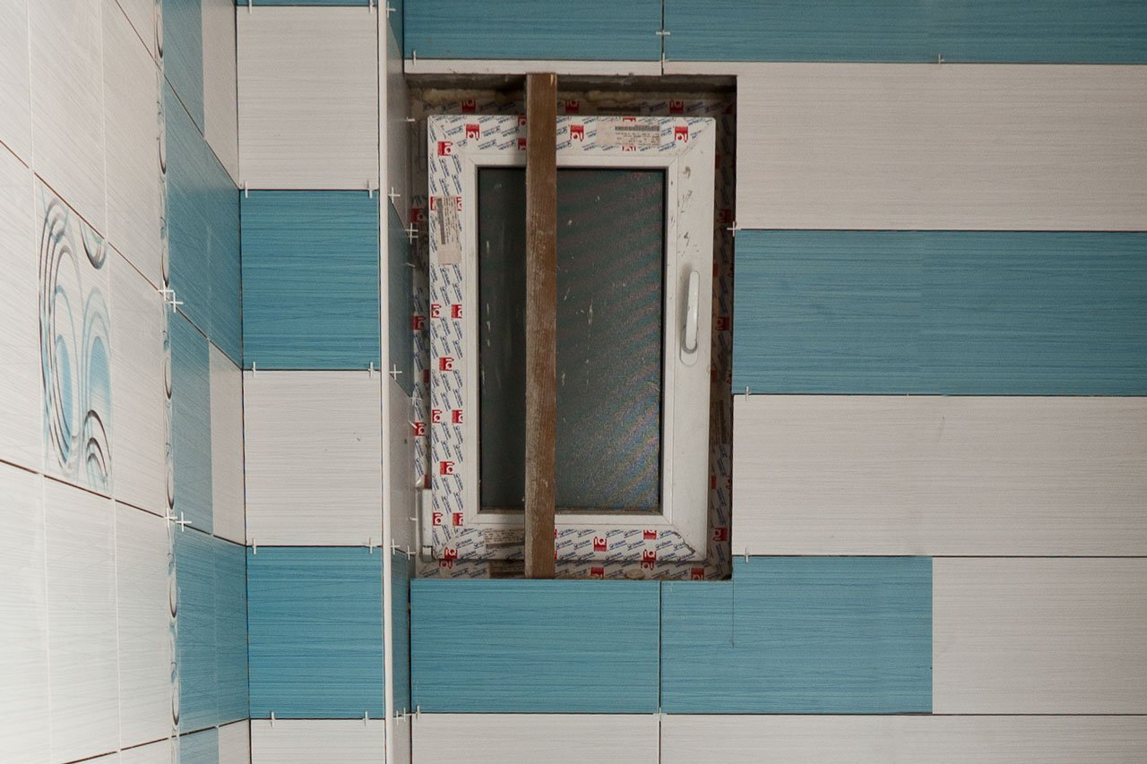 Tile around window