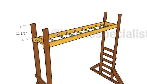 Attaching the monkey bars to the stand
