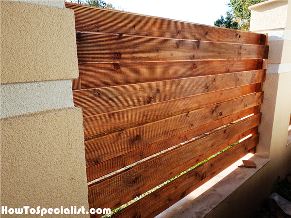 Wooden-panels-for-concrete-fence