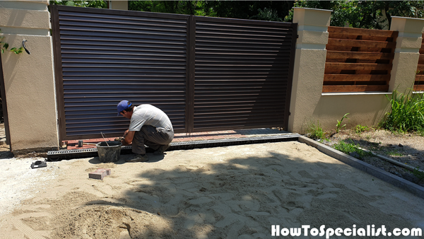 Fitting-the-gutter-channels---driveway-project