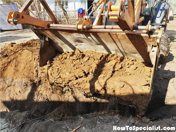 Filling-the-drain-trench-with-soil