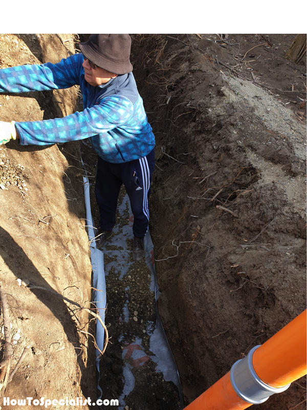 Fitting-the-geotextile-fabric-to-the-trench