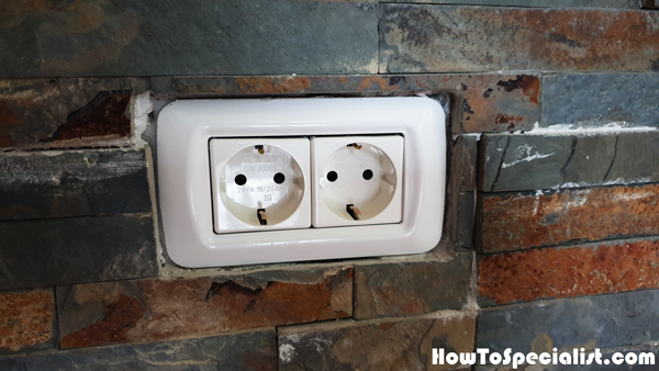 Cutting-the-stone-cladding-around-the-outlets