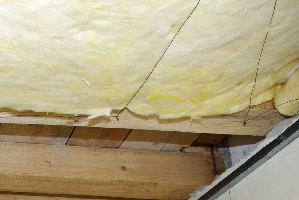 Securing mineral wool with wire