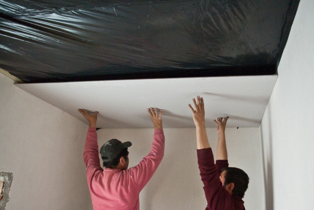 Installing drywall on ceiling