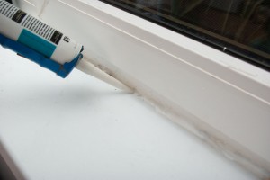 Caulking around window sill