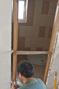 Fixing door into opening