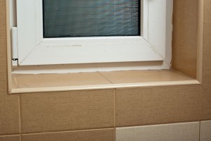 Installing tile around window