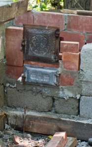 Installing the cast iron stove doors