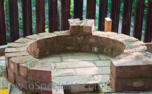 Making the dome-shaped pizza oven