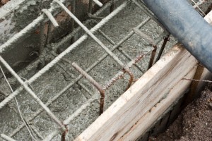 Pouring concrete into footings