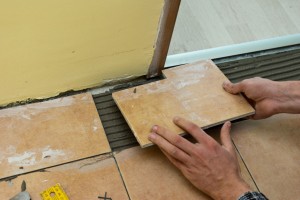 Installing tile around door jamb