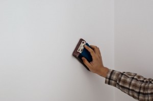 Sanding wall plaster