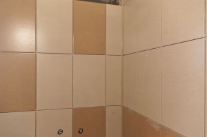 Grouting wall tiles