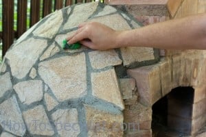 Cleaning the pizza oven