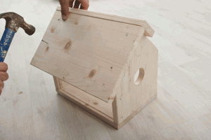 Installing the roof of the feeder