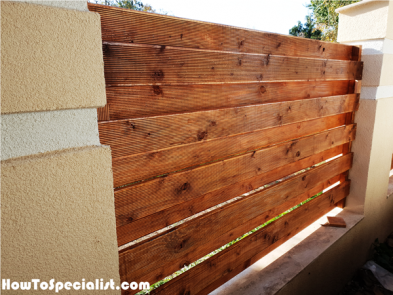 Wooden-panels-for-concrete-fence