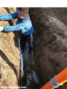 Fitting-the-geotextile-fabric-to-the-trench