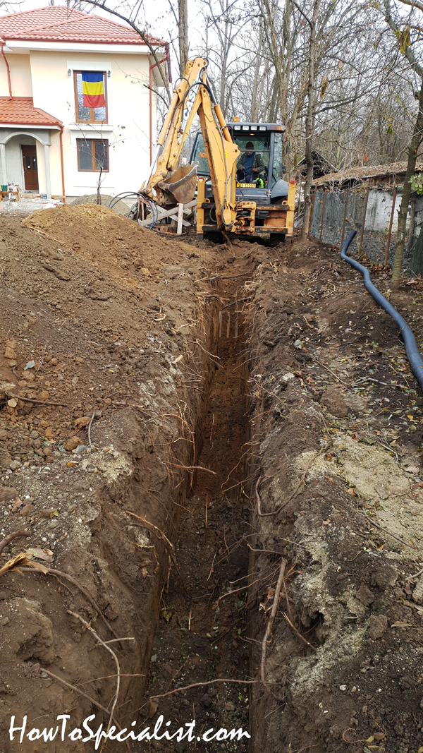 Digging-trench-with-back-hoe