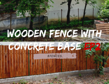 Wooden fence with concrete base