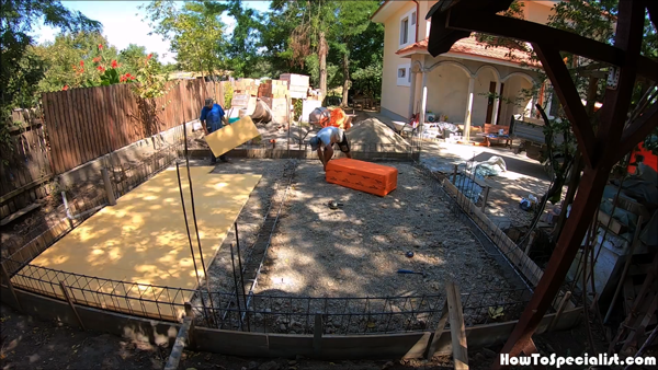 Laying-the-insulation-sheets-under-the-floor