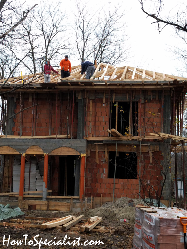 Building-the-roof-for-the-brick-house