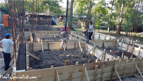 Pouring-concrete-into-foundation-elevation