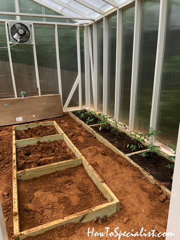 Garden-bed-inside-wood-greenhouse