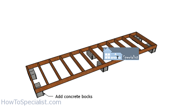 Fitting-the-concrete-blocks-under-the-floor-frame