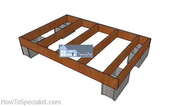 Fitting-the-concrete-blocks-under-the-floor-shed