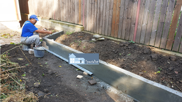 Installing-the-travertine-cladding